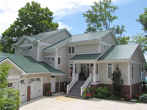 white house with green metal roof|exterior colors with green roof.